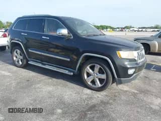 2012 Jeep Grand Cherokee Overland z VIN 1C4RJECT9CC137755, wystawiony jako IAAI lot #43106427 z przebiegiem 140 639 mil mil oraz . Historia ofert i sprzedaży dostępna na DreamBid. Obrazek 1.