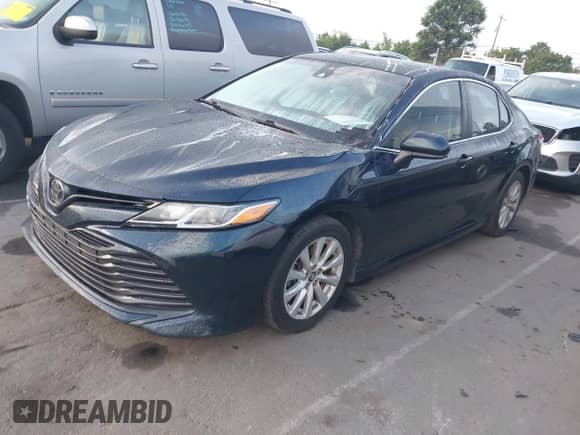 2018 Toyota Camry SE with VIN 4T1B11HK2JU647720, listed as a IAAI auction lot 42849487 with 159,188 mi miles and . Bid and sale history available at DreamBid. Image 2.