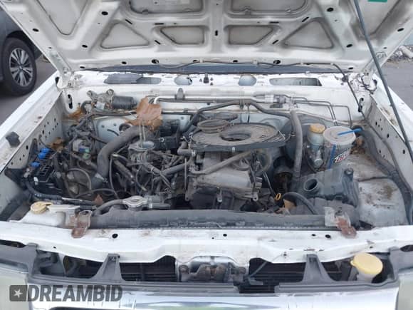 2000 Nissan Frontier XE with VIN 1N6DD21S9YC392498, listed as a IAAI auction lot 42883961 with Not provided miles and . Bid and sale history available at DreamBid. Image 10.