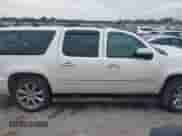 2013 Chevrolet Suburban LTZ z VIN 1GNSCKE00DR209381, wystawiony jako IAAI lot #42469271 z przebiegiem Nie podano mil oraz . Historia ofert i sprzedaży dostępna na DreamBid. Obrazek 13.