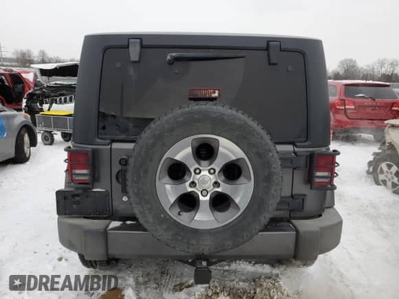 2018 Jeep Wrangler Sahara with VIN 1C4AJWBG0JL806032, listed as a Copart auction lot 88333345 with 103,922 mi miles and Salvage title. Bid and sale history available at DreamBid. Image 6.