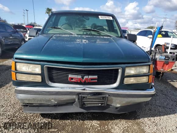 1998 GMC Sierra 1500 z VIN 1GTEC14M1WZ510653, wystawiony jako Copart lot #46268765 z przebiegiem 177 385 mil mil oraz Szkoda całkowita • Salvage title. Historia ofert i sprzedaży dostępna na DreamBid. Obrazek 5.