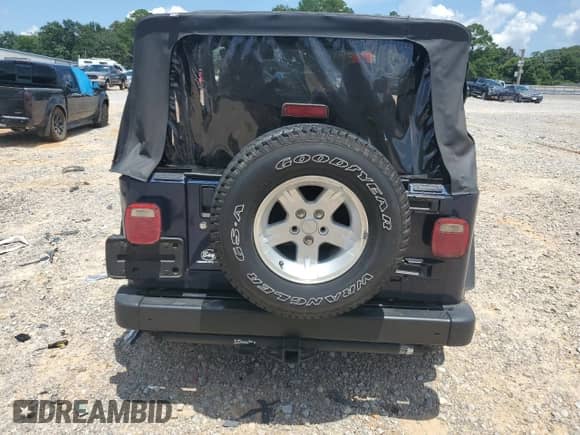 2006 Jeep Wrangler Sport z VIN 1J4FA49S46P710371, wystawiony jako Copart lot #63701095 z przebiegiem 110 750 mil mil oraz Szkoda całkowita • Salvage title. Historia ofert i sprzedaży dostępna na DreamBid. Obrazek 6.