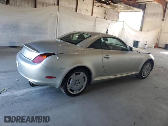 2004 Lexus SC 430 z VIN JTHFN48Y640056624, wystawiony jako Copart lot #71527975 z przebiegiem 111 582 mil mil oraz Szkoda całkowita • Salvage title. Historia ofert i sprzedaży dostępna na DreamBid. Obrazek 3.