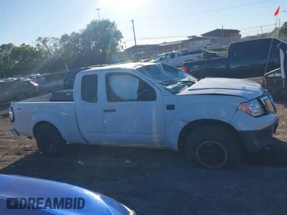 2015 Nissan Frontier S with VIN 1N6BD0CT0FN745410, listed as a IAAI auction lot 43394333 with 209,865 mi miles and . Bid and sale history available at DreamBid. Image 13.