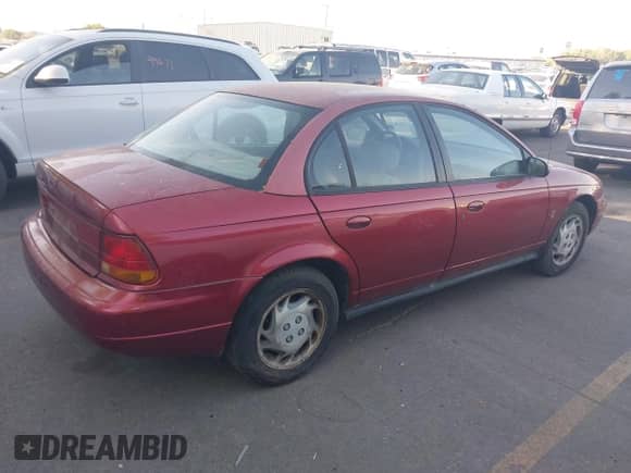 1997 Saturn SL с VIN 1G8ZK5273VZ213711, выставлен на аукционе IAAI как лот 42894168 с пробегом 85 634 миль миль и . История ставок и продаж доступна на DreamBid. Изображение 4.