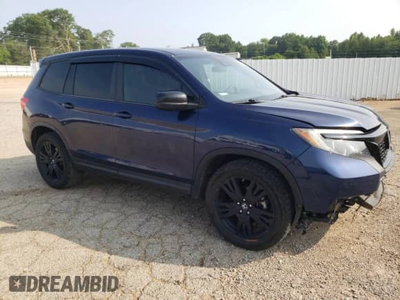 2019 Honda Passport Sport with VIN 5FNYF8H29KB023657, listed as a Copart auction lot 60365465 with 269,360 mi miles and Salvage title. Bid and sale history available at DreamBid. Image 4.