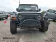 2001 Jeep Wrangler SE with VIN 1J4FA29P41P328835, listed as a Copart auction lot 68713745 with 274,578 mi miles and Clean title. Bid and sale history available at DreamBid. Image 5.