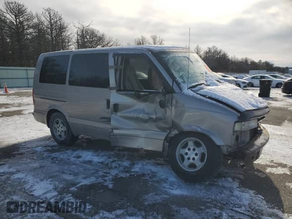 2005 Chevrolet Astro z VIN 1GNDM19X55B128751, wystawiony jako Copart lot #88860595 z przebiegiem Nie podano mil oraz Szkoda całkowita • Salvage title. Historia ofert i sprzedaży dostępna na DreamBid. Obrazek 4.