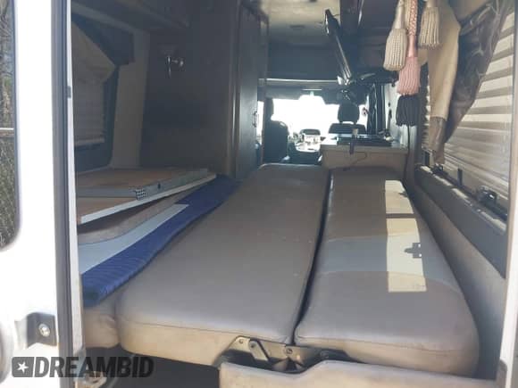 2003 Dodge Sprinter with VIN WD2YD742235506169, listed as a IAAI auction lot 41867585 with 193,259 mi miles and . Bid and sale history available at DreamBid. Image 12.