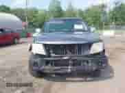 2009 Nissan Frontier SE with VIN 1N6AD09W19C407379, listed as a IAAI auction lot 42494543 with 209,680 mi miles and . Bid and sale history available at DreamBid. Image 6.