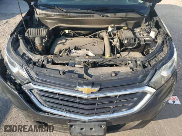 2018 Chevrolet Equinox LT с VIN 3GNAXTEX1JS561915, выставлен на аукционе Copart как лот 68659885 с пробегом 68 856 миль миль и Списание • Salvage title. История ставок и продаж доступна на DreamBid. Изображение 12.