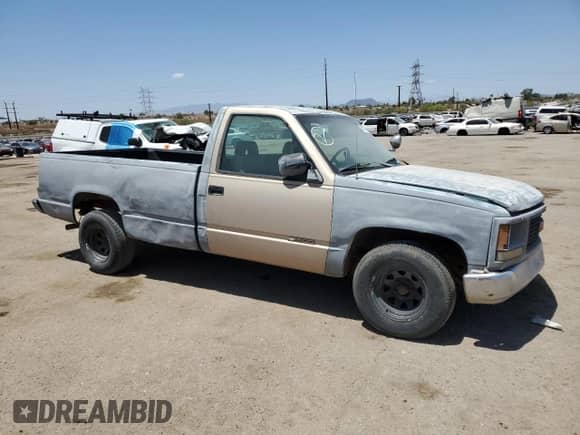 1994 GMC Sierra 1500 z VIN 1GTDC14Z4RZ511890, wystawiony jako Copart lot #62610105 z przebiegiem 214 182 mil mil oraz Czysty tytuł • Clean title. Historia ofert i sprzedaży dostępna na DreamBid. Obrazek 4.
