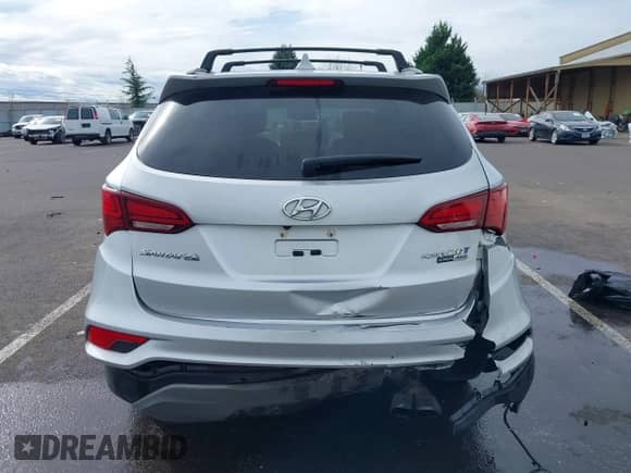 2018 Hyundai Santa Fe Ultimate with VIN 5XYZWDLA7JG542869, listed as a IAAI auction lot 41889520 with 51,294 mi miles and . Bid and sale history available at DreamBid. Image 16.