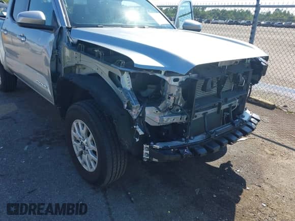 2024 Toyota Tacoma TRD Off Road with VIN 3TMLB5JN8RM010395, listed as a IAAI auction lot 43375716 with 20,319 mi miles and . Bid and sale history available at DreamBid. Image 6.