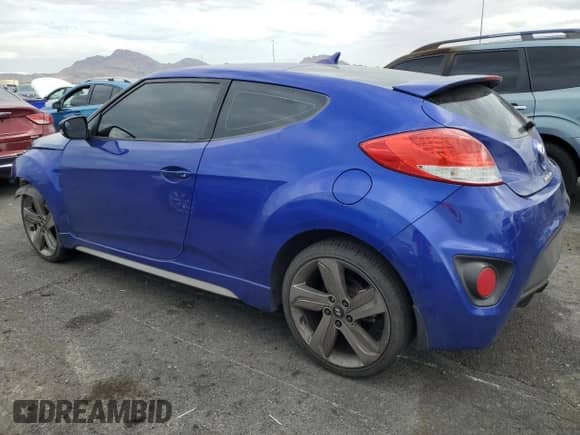 2013 Hyundai Veloster Turbo с VIN KMHTC6AE6DU159195, выставлен на аукционе Copart как лот 70498595 с пробегом 132 896 миль миль и Списание • Salvage title. История ставок и продаж доступна на DreamBid. Изображение 2.