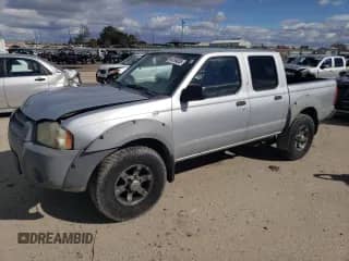 2001 Nissan Frontier XE with VIN 1N6ED27TX1C371251, listed as a Copart auction lot 46754825 with 163,974 mi miles and Salvage title. Bid and sale history available at DreamBid. Image 1.