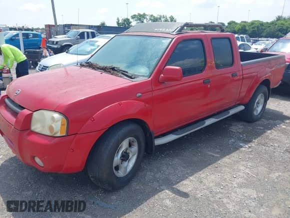 2002 Nissan Frontier XE with VIN 1N6ED29Y32C325674, listed as a IAAI auction lot 42805583 with 393,837 mi miles and . Bid and sale history available at DreamBid. Image 2.