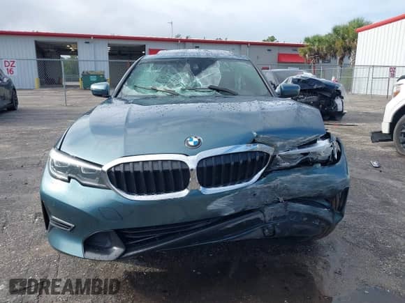 2020 BMW 3 Series 330i with VIN 3MW5R1J0XL8B39110, listed as a IAAI auction lot 43425538 with Not provided miles and . Bid and sale history available at DreamBid. Image 12.