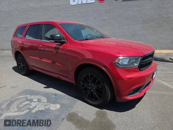 2015 Dodge Durango Limited with VIN 1C4RDJDGXFC881242, listed as a Copart auction lot 60501515 with 129,089 mi miles and Clean title. Bid and sale history available at DreamBid. Image 1.