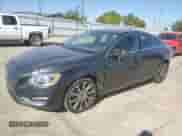 2015 Volvo S60 with VIN YV126MFD0F1309666, listed as a Copart auction lot 77844894 with 130,570 mi miles and Salvage title. Bid and sale history available at DreamBid. Image 1.
