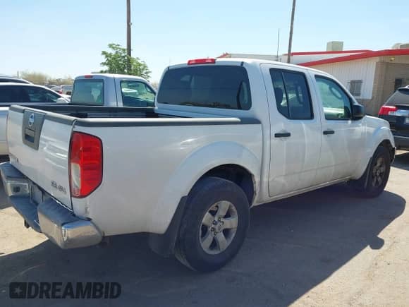 2010 Nissan Frontier Pro-4X with VIN 1N6AD0EV3AC417753, listed as a IAAI auction lot 41850149 with 216,491 mi miles and . Bid and sale history available at DreamBid. Image 4.