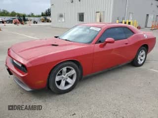 2012 Dodge Challenger SXT z VIN 2C3CDYAG1CH161781, wystawiony jako Copart lot #82250955 z przebiegiem 167 365 mil mil oraz Czysty tytuł • Clean title. Historia ofert i sprzedaży dostępna na DreamBid. Obrazek 1.