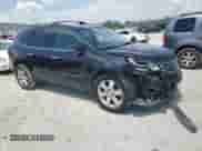2013 Chevrolet Traverse LTZ z VIN 1GNKRLKD2DJ117778, wystawiony jako Copart lot #61408935 z przebiegiem 160 438 mil mil oraz Szkoda całkowita • Salvage title. Historia ofert i sprzedaży dostępna na DreamBid. Obrazek 4.