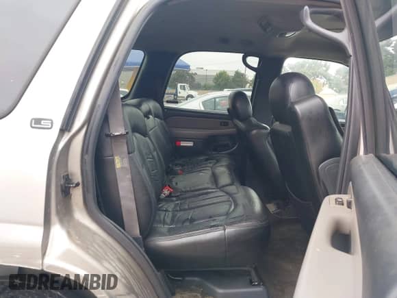 2002 Chevrolet Tahoe LS with VIN 1GNEC13T92J142098, listed as a IAAI auction lot 43444468 with 300,032 mi miles and . Bid and sale history available at DreamBid. Image 8.