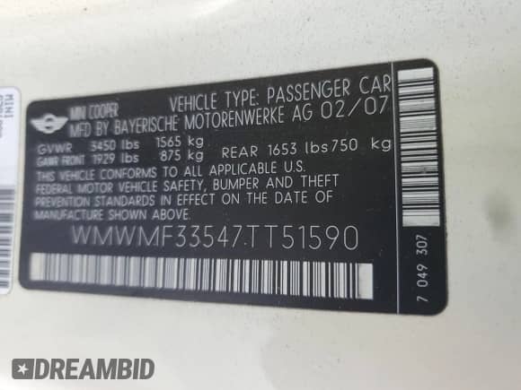 2007 MINI Hardtop with VIN WMWMF33547TT51590, listed as a Copart auction lot 57323995 with 114,113 mi miles and Salvage title. Bid and sale history available at DreamBid. Image 12.