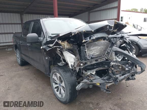 2019 Ford F-150 XLT with VIN 1FTEW1EP2KKF02063, listed as a IAAI auction lot 42926693 with 128,503 mi miles and . Bid and sale history available at DreamBid. Image 1.