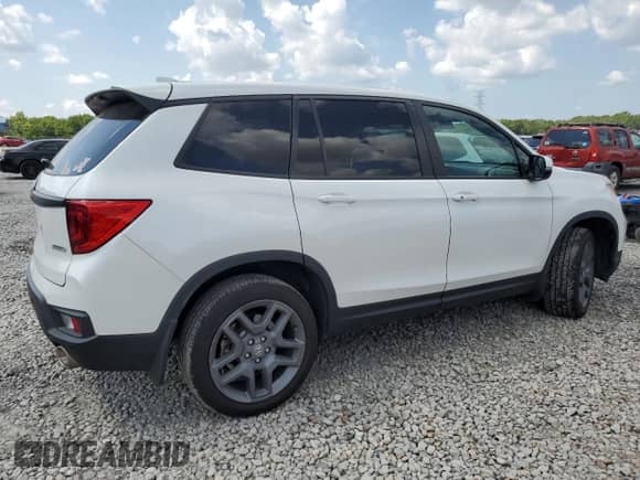 2023 Honda Passport EX-L with VIN 5FNYF8H5XPB018355, listed as a Copart auction lot 66667405 with 26,126 mi miles and Salvage title. Bid and sale history available at DreamBid. Image 3.