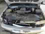 2003 Chevrolet Suburban LT z VIN 3GNFK16Z33G218425, wystawiony jako Copart lot #81138144 z przebiegiem 246 985 mil mil oraz Szkoda całkowita • Salvage title. Historia ofert i sprzedaży dostępna na DreamBid. Obrazek 14.