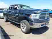 2015 Ram 1500 Laramie Limited with VIN 1C6RR7PT5FS552426, listed as a IAAI auction lot 42039997 with 167,944 mi miles and . Bid and sale history available at DreamBid. Image 1.