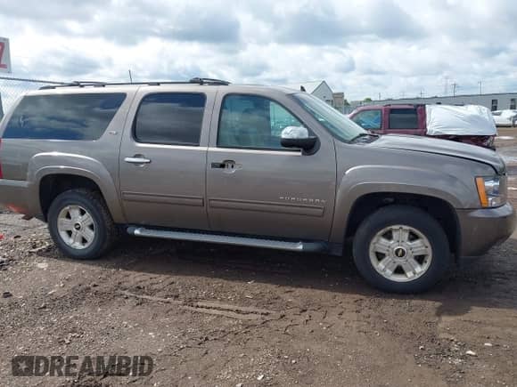 2012 Chevrolet Suburban LT with VIN 1GNSKJE77CR175142, listed as a IAAI auction lot 42546388 with 227,658 mi miles and . Bid and sale history available at DreamBid. Image 13.