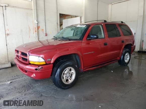 1998 Dodge Durango with VIN 1B4HS28Y5WF100889, listed as a Copart auction lot 57709425 with 261,895 mi miles and Salvage title. Bid and sale history available at DreamBid. Image 1.