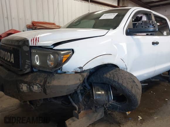 2013 Toyota Tundra with VIN 5TFDY5F10DX274318, listed as a IAAI auction lot 41729475 with 253,873 mi miles and . Bid and sale history available at DreamBid. Image 6.