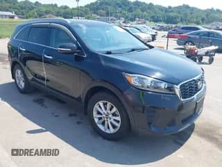 2019 Kia Sorento L with VIN 5XYPG4A35KG572575, listed as a IAAI auction lot 43012602 with 86,540 mi miles and . Bid and sale history available at DreamBid. Image 1.