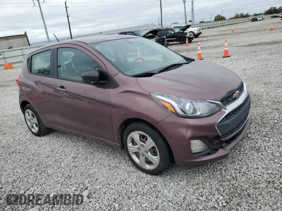 2021 Chevrolet Spark LS with VIN KL8CB6SA3MC719434, listed as a Copart auction lot 82637135 with 144,666 mi miles and Salvage title. Bid and sale history available at DreamBid. Image 4.