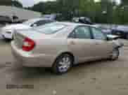 2004 Toyota Camry LE z VIN 4T1BE32K34U930804, wystawiony jako Copart lot #81278975 z przebiegiem Nie podano mil oraz Szkoda całkowita • Salvage title. Historia ofert i sprzedaży dostępna na DreamBid. Obrazek 3.