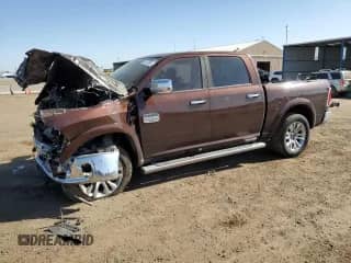 2015 Ram 1500 Laramie Longhorn with VIN 1C6RR7PT7FS683065, listed as a Copart auction lot 52747085 with 143,209 mi miles and Salvage title. Bid and sale history available at DreamBid. Image 1.