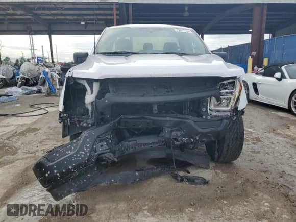 2021 Ford F-150 XL z VIN 1FTMF1E5XMKE93125, wystawiony jako Copart lot #79877134 z przebiegiem 61 418 mil mil oraz Nie do naprawy • Non repairable. Historia ofert i sprzedaży dostępna na DreamBid. Obrazek 5.