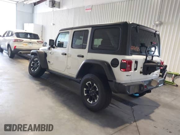 2024 Jeep Wrangler Rubicon с VIN 1C4RJXR60RW292764, выставлен на аукционе IAAI как лот 42761185 с пробегом 34 298 миль миль и . История ставок и продаж доступна на DreamBid. Изображение 3.