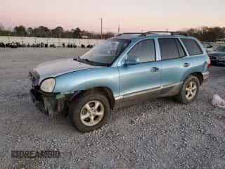2003 Hyundai Santa Fe GLS z VIN KM8SC13D53U554812, wystawiony jako Copart lot #86789014 z przebiegiem Nie podano mil oraz Szkoda całkowita • Salvage title. Historia ofert i sprzedaży dostępna na DreamBid. Obrazek 1.