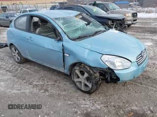 2010 Hyundai Accent Blue z VIN KMHCM3AC7AU175461, wystawiony jako IAAI lot #41408642 z przebiegiem 151 660 mil mil oraz . Historia ofert i sprzedaży dostępna na DreamBid. Obrazek 1.