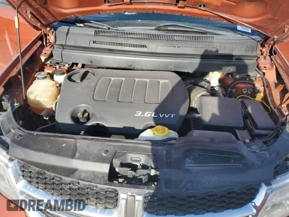 2014 Dodge Journey Limited с VIN 3C4PDCDG5ET105851, выставлен на аукционе Copart как лот 66595675 с пробегом 144 093 миль миль и На запчасти • Non repairable. История ставок и продаж доступна на DreamBid. Изображение 14.