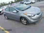 2013 Hyundai Elantra GLS z VIN KMHDH4AE9DU523071, wystawiony jako IAAI lot #43586642 z przebiegiem 176 733 mil mil oraz . Historia ofert i sprzedaży dostępna na DreamBid. Obrazek 1.