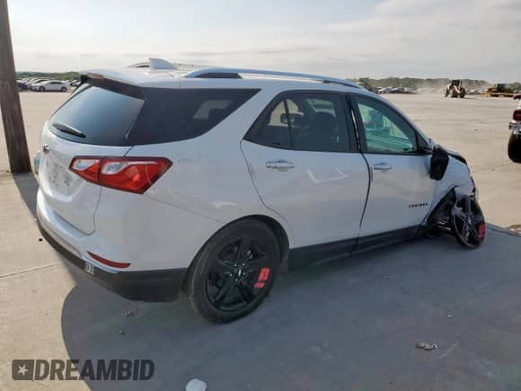 2020 Chevrolet Equinox Premier с VIN 2GNAXNEV1L6218176, выставлен на аукционе Copart как лот 66486395 с пробегом 36 849 миль миль и Списание • Salvage title. История ставок и продаж доступна на DreamBid. Изображение 3.