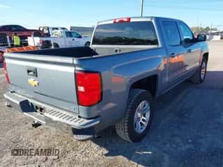 2016 Chevrolet Silverado 1500 LT z VIN 3GCPCREC5GG300541, wystawiony jako IAAI lot #43505634 z przebiegiem 186 728 mil mil oraz . Historia ofert i sprzedaży dostępna na DreamBid. Obrazek 4.