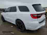 2014 Dodge Durango R/T with VIN 1C4SDJCT8EC418692, listed as a Copart auction lot 57866135 with 173,599 mi miles and Salvage title. Bid and sale history available at DreamBid. Image 2.